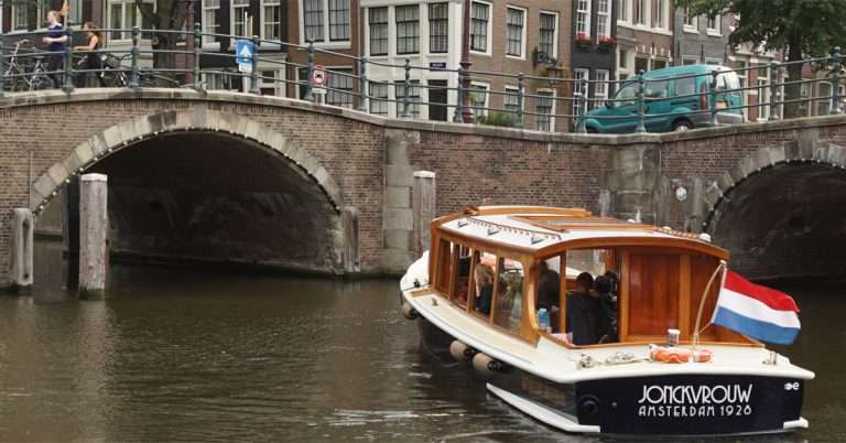 Amsterdam Early Morning Canal Cruise - 1928 King's boat Jonckvrouw